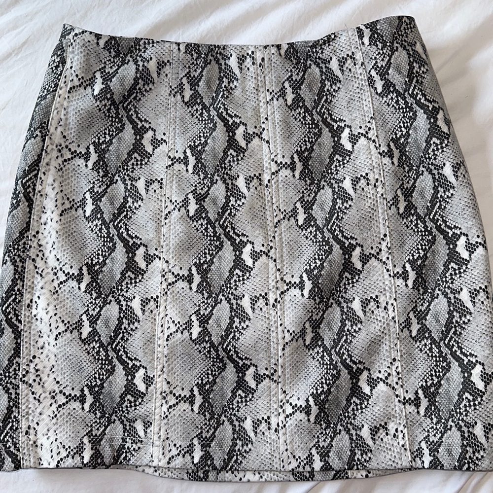 Snake print leather mini skirt